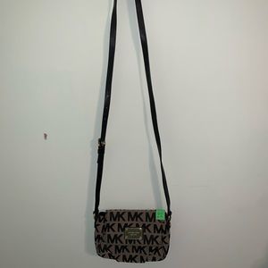 Black and gray Michael Kors crossbody purse
